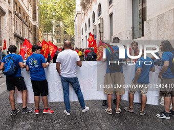 Italian bus industry workers rally in front of the Enterprises & Made in Italy Ministry to protest against the factory relocation from Bolog...