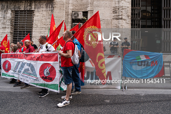 Italian bus industry workers rally in front of the Enterprises & Made in Italy Ministry to protest against the factory relocation from Bolog...