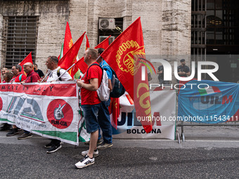 Italian bus industry workers rally in front of the Enterprises & Made in Italy Ministry to protest against the factory relocation from Bolog...