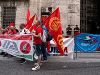 Italian bus industry workers rally in front of the Enterprises & Made in Italy Ministry to protest against the factory relocation from Bolog...