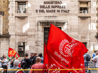 Italian bus industry workers rally in front of the Enterprises & Made in Italy Ministry to protest against the factory relocation from Bolog...