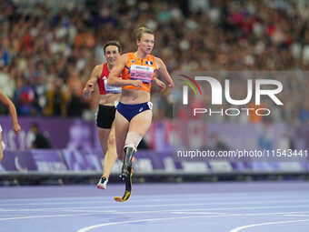 Marlene Van Gansewinkel of Netherlands celebrates winning silver in Women's 200m - T64 Final during the Paris 2024 Paralympic Games at Stade...