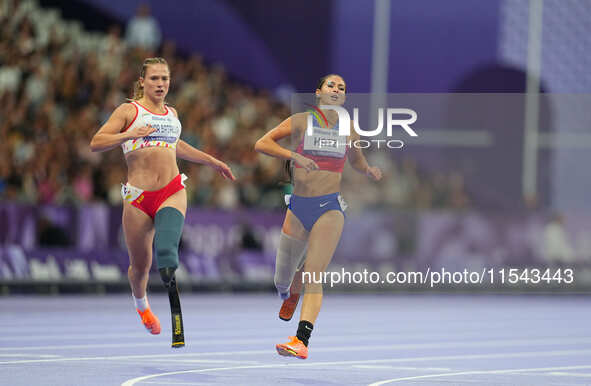 B Hatz of United States of America celebrates winning silver in Women's 200m - T64 Final during the Paris 2024 Paralympic Games at Stade de...