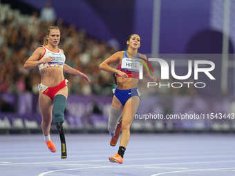 B Hatz of United States of America celebrates winning silver in Women's 200m - T64 Final during the Paris 2024 Paralympic Games at Stade de...