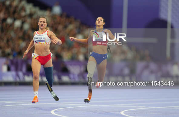 B Hatz of United States of America celebrates winning silver in Women's 200m - T64 Final during the Paris 2024 Paralympic Games at Stade de...