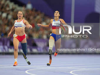 B Hatz of United States of America celebrates winning silver in Women's 200m - T64 Final during the Paris 2024 Paralympic Games at Stade de...