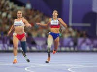 B Hatz of United States of America celebrates winning silver in Women's 200m - T64 Final during the Paris 2024 Paralympic Games at Stade de...