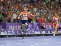 Kimberly Alkemade of Netherlands celebrates winning gold in Women's 200m - T64 Final during the Paris 2024 Paralympic Games at Stade de Fran...