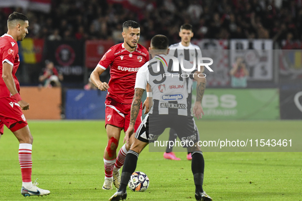 Astrit Selmani is in action during Universitatea Cluj vs. Dinamo Bucuresti at Cluj Arena in Cluj-Napoca, Romania, on September 2, 2024 