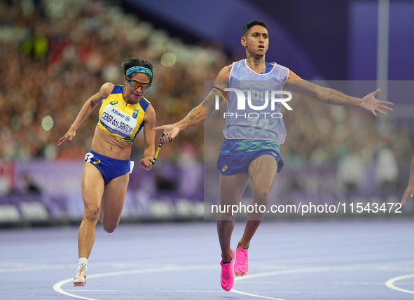 Jerusa Geber Dos Santos of Brazil celebrates winning gold in Women's 100m - T11 Final during the Paris 2024 Paralympic Games at Stade de Fra...