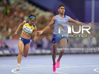 Jerusa Geber Dos Santos of Brazil celebrates winning gold in Women's 100m - T11 Final during the Paris 2024 Paralympic Games at Stade de Fra...