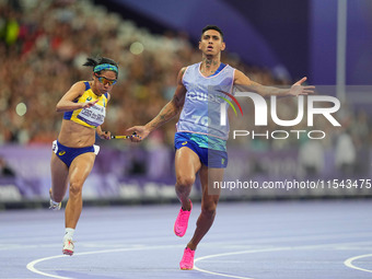 Jerusa Geber Dos Santos of Brazil celebrates winning gold in Women's 100m - T11 Final during the Paris 2024 Paralympic Games at Stade de Fra...