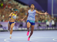 Jerusa Geber Dos Santos of Brazil celebrates winning gold in Women's 100m - T11 Final during the Paris 2024 Paralympic Games at Stade de Fra...