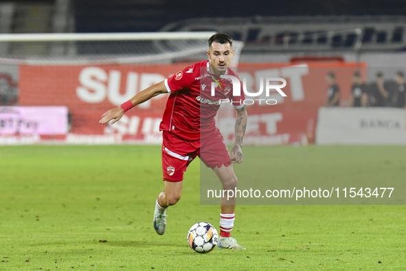 Raul Oprut is in action during Universitatea Cluj vs. Dinamo Bucuresti at Cluj Arena in Cluj-Napoca, Romania, on September 2, 2024 