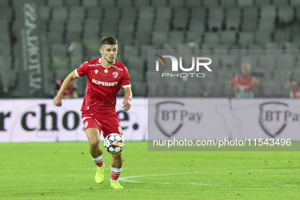 Cristian Costin is in action during Universitatea Cluj vs. Dinamo Bucuresti at Cluj Arena in Cluj-Napoca, Romania, on September 2, 2024 