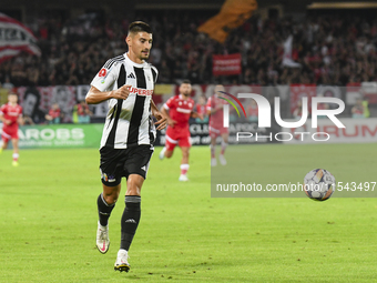 Iulian Cristea is in action during Universitatea Cluj vs. Dinamo Bucuresti at Cluj Arena in Cluj-Napoca, Romania, on September 2, 2024. (