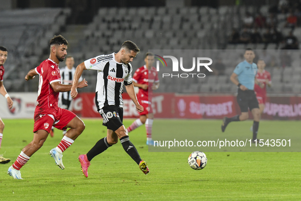 Alexandru Chipciu is in action during Universitatea Cluj vs. Dinamo Bucuresti at Cluj Arena in Cluj-Napoca, Romania, on September 2, 2024 