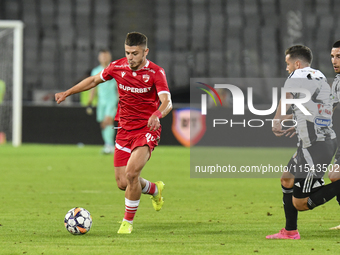 Cristian Costin is in action during Universitatea Cluj vs. Dinamo Bucuresti at Cluj Arena in Cluj-Napoca, Romania, on September 2, 2024 (