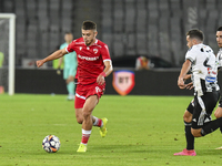 Cristian Costin is in action during Universitatea Cluj vs. Dinamo Bucuresti at Cluj Arena in Cluj-Napoca, Romania, on September 2, 2024 (