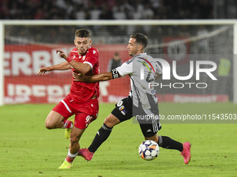 Cristian Costin and Alexandru Chipciu are in action during Universitatea Cluj vs. Dinamo Bucuresti at Cluj Arena in Cluj-Napoca, Romania, on...