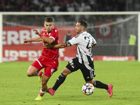 Cristian Costin and Alexandru Chipciu are in action during Universitatea Cluj vs. Dinamo Bucuresti at Cluj Arena in Cluj-Napoca, Romania, on...