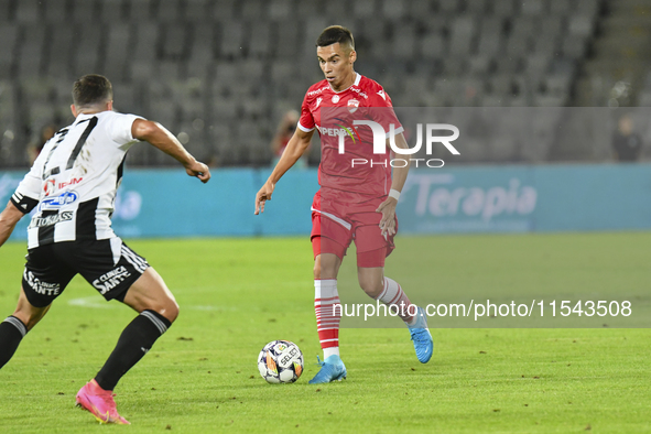 Catalin Cirjan is in action during Universitatea Cluj vs. Dinamo Bucuresti at Cluj Arena in Cluj-Napoca, Romania, on September 2, 2024. 