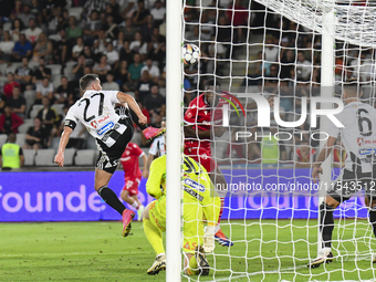 Josue Homawoo is in action during Universitatea Cluj vs. Dinamo Bucuresti at Cluj Arena in Cluj-Napoca, Romania, on September 2, 2024. (