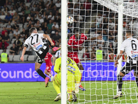 Josue Homawoo is in action during Universitatea Cluj vs. Dinamo Bucuresti at Cluj Arena in Cluj-Napoca, Romania, on September 2, 2024. (