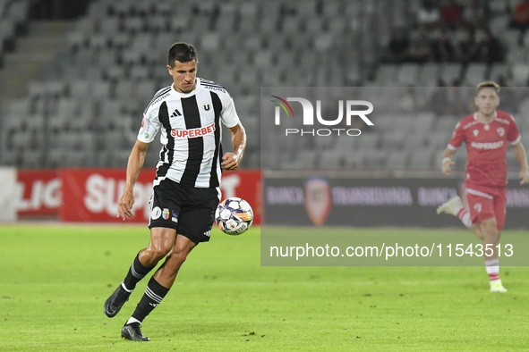 Lucas Masoero is in action during the Universitatea Cluj vs. Dinamo Bucuresti match at Cluj Arena in Cluj-Napoca, Romania, on September 2, 2...