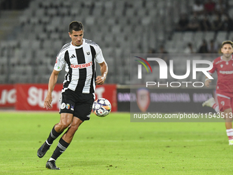 Lucas Masoero is in action during the Universitatea Cluj vs. Dinamo Bucuresti match at Cluj Arena in Cluj-Napoca, Romania, on September 2, 2...