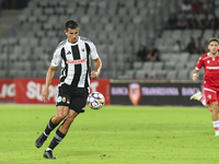 Lucas Masoero is in action during the Universitatea Cluj vs. Dinamo Bucuresti match at Cluj Arena in Cluj-Napoca, Romania, on September 2, 2...