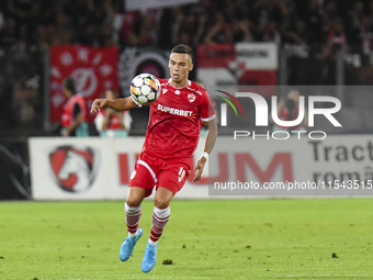 Catalin Cirjan is in action during Universitatea Cluj vs. Dinamo Bucuresti at Cluj Arena in Cluj-Napoca, Romania, on September 2, 2024. (