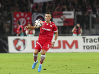 Catalin Cirjan is in action during Universitatea Cluj vs. Dinamo Bucuresti at Cluj Arena in Cluj-Napoca, Romania, on September 2, 2024. (