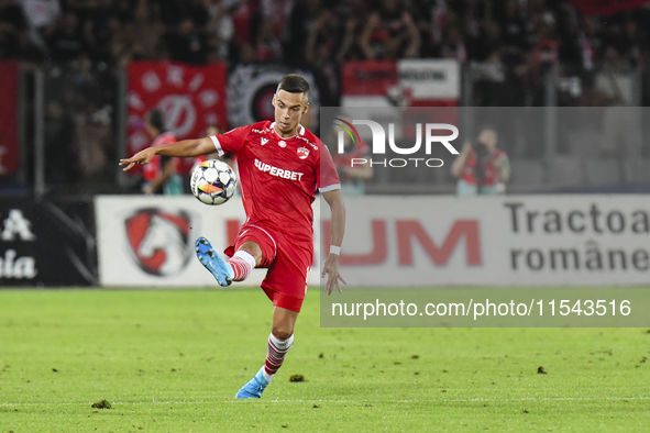 Catalin Cirjan is in action during Universitatea Cluj vs. Dinamo Bucuresti at Cluj Arena in Cluj-Napoca, Romania, on September 2, 2024. 