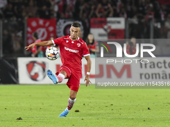 Catalin Cirjan is in action during Universitatea Cluj vs. Dinamo Bucuresti at Cluj Arena in Cluj-Napoca, Romania, on September 2, 2024. (