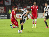 Catalin Cirjan and Ovidiu Popescu are in action during the Universitatea Cluj vs. Dinamo Bucuresti match at Cluj Arena in Cluj-Napoca, Roman...