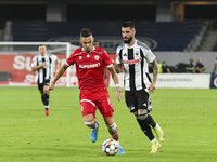 Catalin Cirjan and Radu Boboc are in action during Universitatea Cluj vs. Dinamo Bucuresti at Cluj Arena in Cluj-Napoca, Romania, on Septemb...