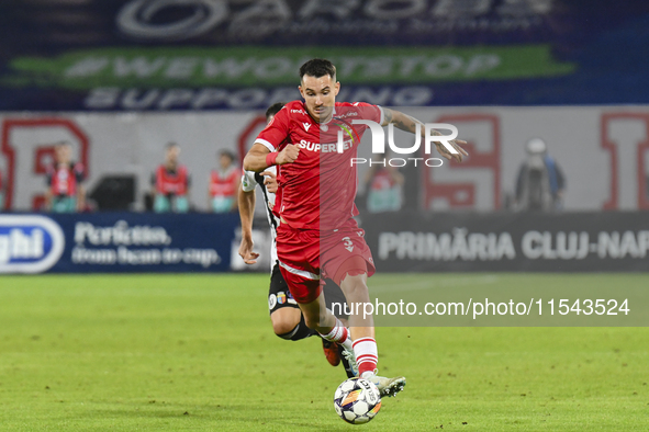 Raul Oprut is in action during Universitatea Cluj vs. Dinamo Bucuresti at Cluj Arena in Cluj-Napoca, Romania, on September 2, 2024 