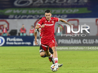 Raul Oprut is in action during Universitatea Cluj vs. Dinamo Bucuresti at Cluj Arena in Cluj-Napoca, Romania, on September 2, 2024 (