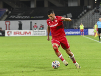 Astrit Selmani is in action during Universitatea Cluj vs. Dinamo Bucuresti at Cluj Arena in Cluj-Napoca, Romania, on September 2, 2024 (