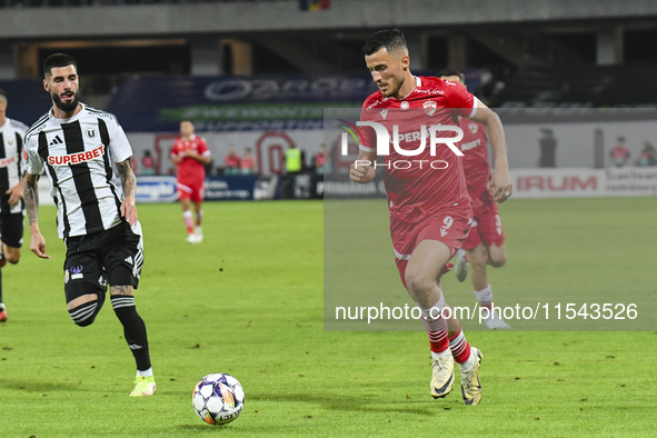 Astrit Selmani is in action during Universitatea Cluj vs. Dinamo Bucuresti at Cluj Arena in Cluj-Napoca, Romania, on September 2, 2024 