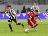 Catalin Cirjan and Vadim Rata are in action during Universitatea Cluj vs. Dinamo Bucuresti at Cluj Arena in Cluj-Napoca, Romania, on Septemb...