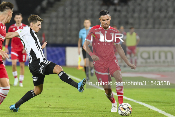 Georgi Milanov is in action during Universitatea Cluj vs. Dinamo Bucuresti at Cluj Arena in Cluj-Napoca, Romania, on September 2, 2024 