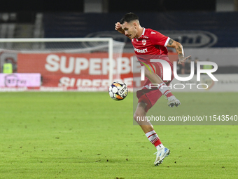 Raul Oprut is in action during Universitatea Cluj vs. Dinamo Bucuresti at Cluj Arena in Cluj-Napoca, Romania, on September 2, 2024 (