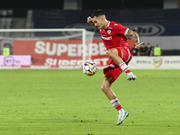 Raul Oprut is in action during Universitatea Cluj vs. Dinamo Bucuresti at Cluj Arena in Cluj-Napoca, Romania, on September 2, 2024 (