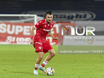 Raul Oprut is in action during Universitatea Cluj vs. Dinamo Bucuresti at Cluj Arena in Cluj-Napoca, Romania, on September 2, 2024 (