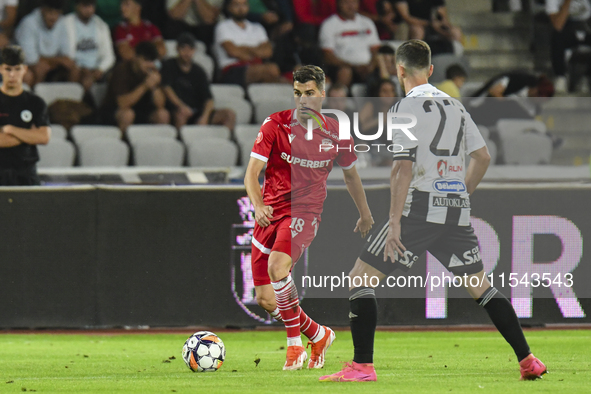 Alberto Soro is in action during Universitatea Cluj vs. Dinamo Bucuresti at Cluj Arena in Cluj-Napoca, Romania, on September 2, 2024 