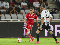 Alberto Soro is in action during Universitatea Cluj vs. Dinamo Bucuresti at Cluj Arena in Cluj-Napoca, Romania, on September 2, 2024 (