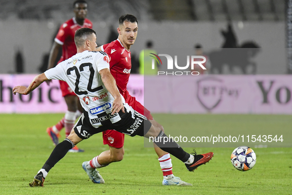 Raul Oprut is in action during Universitatea Cluj vs. Dinamo Bucuresti at Cluj Arena in Cluj-Napoca, Romania, on September 2, 2024 