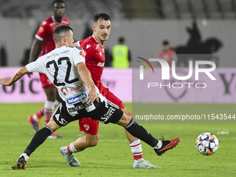 Raul Oprut is in action during Universitatea Cluj vs. Dinamo Bucuresti at Cluj Arena in Cluj-Napoca, Romania, on September 2, 2024 (